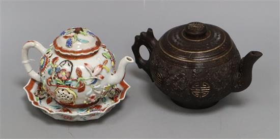 An 18th century Chinese Export famille rose teapot, cover and a similar dish